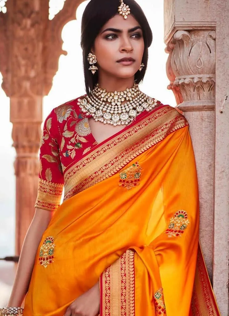 Astounding Orange color Silk Base Festival wear Silk Weave Saree